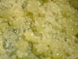 adding rice to onion for risotto